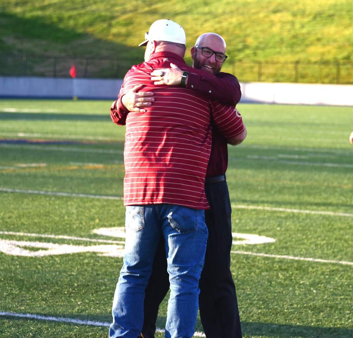 Golden Valley High boys soccer coach Lance Eber hugs Cougars athletic director Matt Thissen after the Cougars’ 4-2 win over Del Oro in the Sac-Joaquin Section Division II championship match at Cosumnes River College in Sacramento, Calif. on Saturday, Feb. 24, 2024.