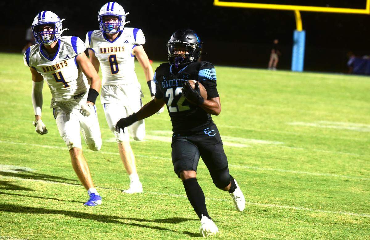 El Capitan High running back Lorenzo Peters (22) runs the ball during a game against Ripon Christian on Friday, Aug. 30, 2024 at Merced College.