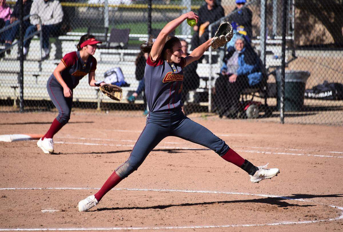 Golden Valley senior Marissa Bertuccio delivers a pitch during the Cougars’ 3-2 win over Del Campo in the Sac-Joaquin Section Division III playoffs on Tuesday night at the Arnaiz Softball Complex in Stockton, Calif.