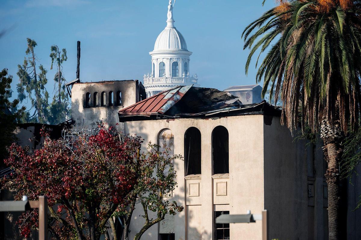 City and county fire crews respond to a structure fire at the historic Merced County High School building located at 2125 M Street in Merced, Calif., on Monday, Dec. 2, 2024. Fire officials said the cause of the fire is under investigation.