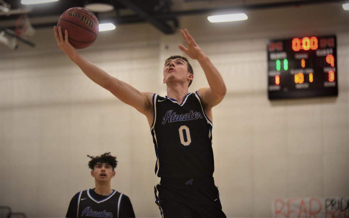 Atwater High junior Colton Dukes goes up for a layup against Merced during a game on Wednesday, Feb. 2, 2022 at Merced High School. Dukes recently surpassed 1,000 career points.