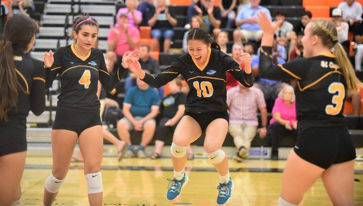 El Capitan High School senior setter Wendy Vang (10) celebrates after a Gauchos’ point during a 3-0 sweep of Merced on Wednesday, Sept. 7, 2022 at Merced High School.