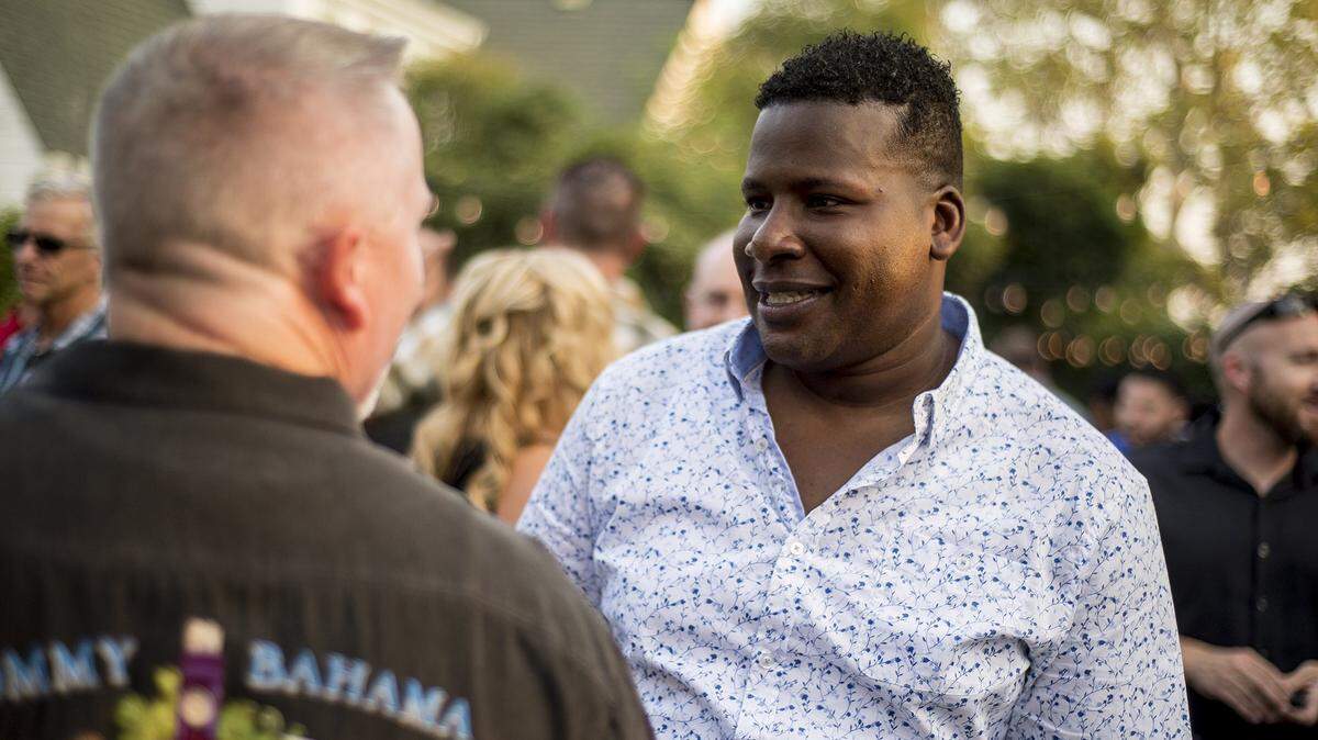Merced City Council District 6 candidate, Delray Shelton, speaks with guests during his campaign kickoff party at the Mansion House in Merced, Calif., on Thursday, Aug. 23, 2018. Shelton is a Sgt. with the Merced County Sheriff’s Office.