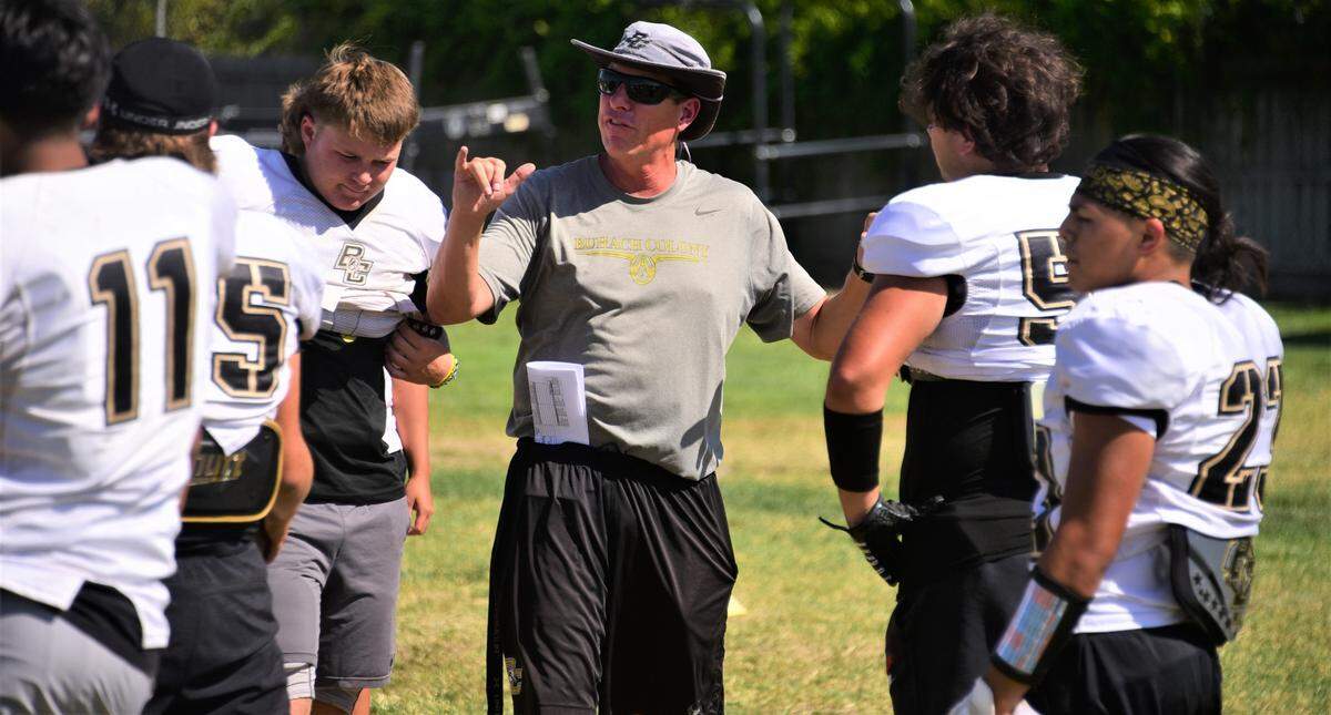 Buhach Colony High School head coach Jerry Dietz coaches during practice on Tuesday, Aug, 16, 2022.