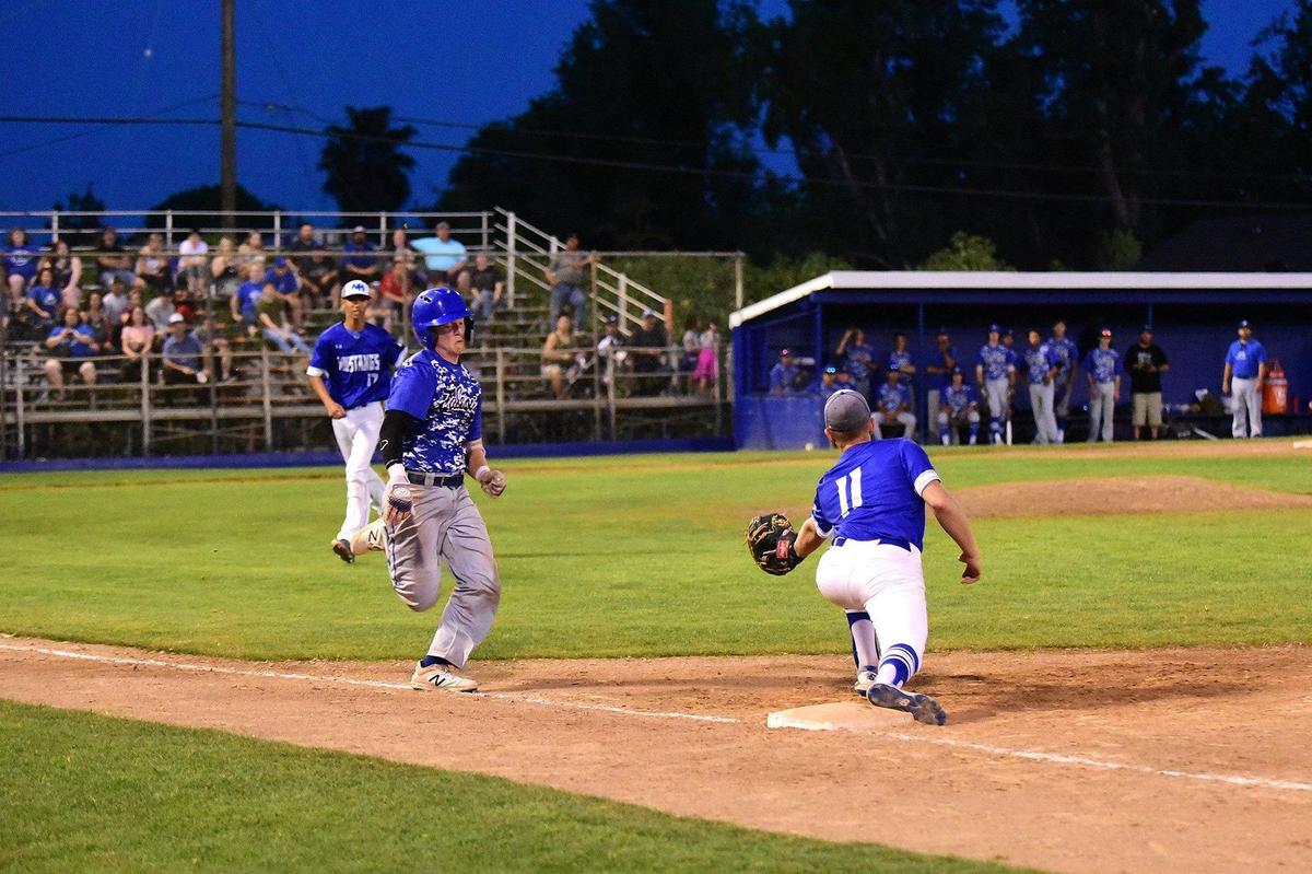 Atwater junior Gunnar Kale (24) attempts to beat out the throw to first base during the championship game against Mountain House in the annual Fran Oneto/Atwater-Winton Lions Easter Baseball Tournament at Memorial Ballpark in Atwater, Calif., on Thursday, April 25, 2019. The Falcons beat the Mustangs 8-1.