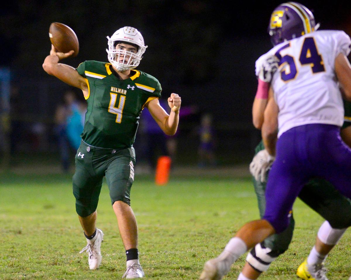 Hilmar quarterback Seth Miguel throws the ball deep down the field during a game between Hilmar High School and Escalon High School at Hilmar High School in Hilmar California on September 20, 2019.