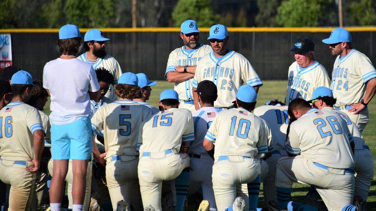 El Capitan High School coach Aaron Ruiz talks to his team following a 9-2 playoff loss to Granite Bay on Thursday, May 11, 2023.