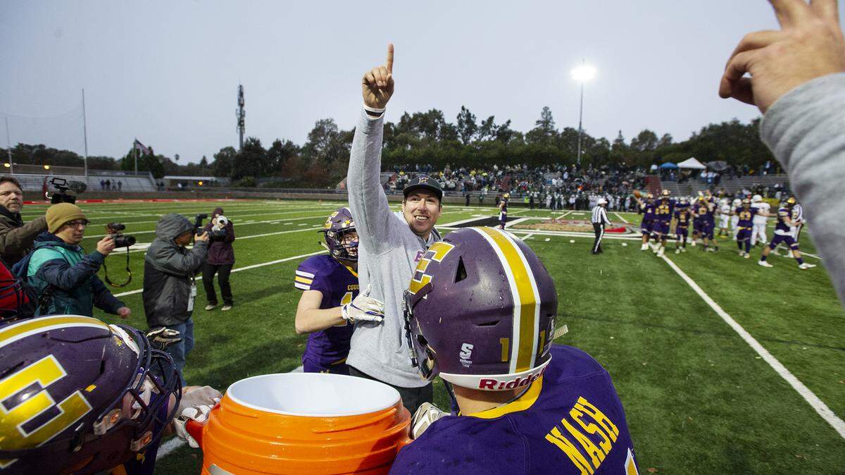 Coach Andrew Beam celebrates Escalon’s 41-27 victory over Hilmar in the Sac-Joaquin Section Division 6 title game at Lincoln High School in Stockton, Calif., Saturday, Nov. 30, 2019.