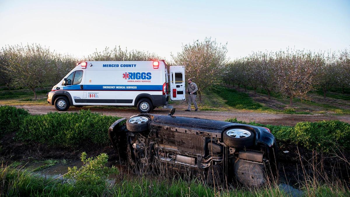 The California Highway Patrol and Riggs Ambulance Service respond to the scene of crash near the intersection of Bellevue Road and M Street in 2019. County supervisors voted to select a new ambulance provider and sever ties with Riggs. 
