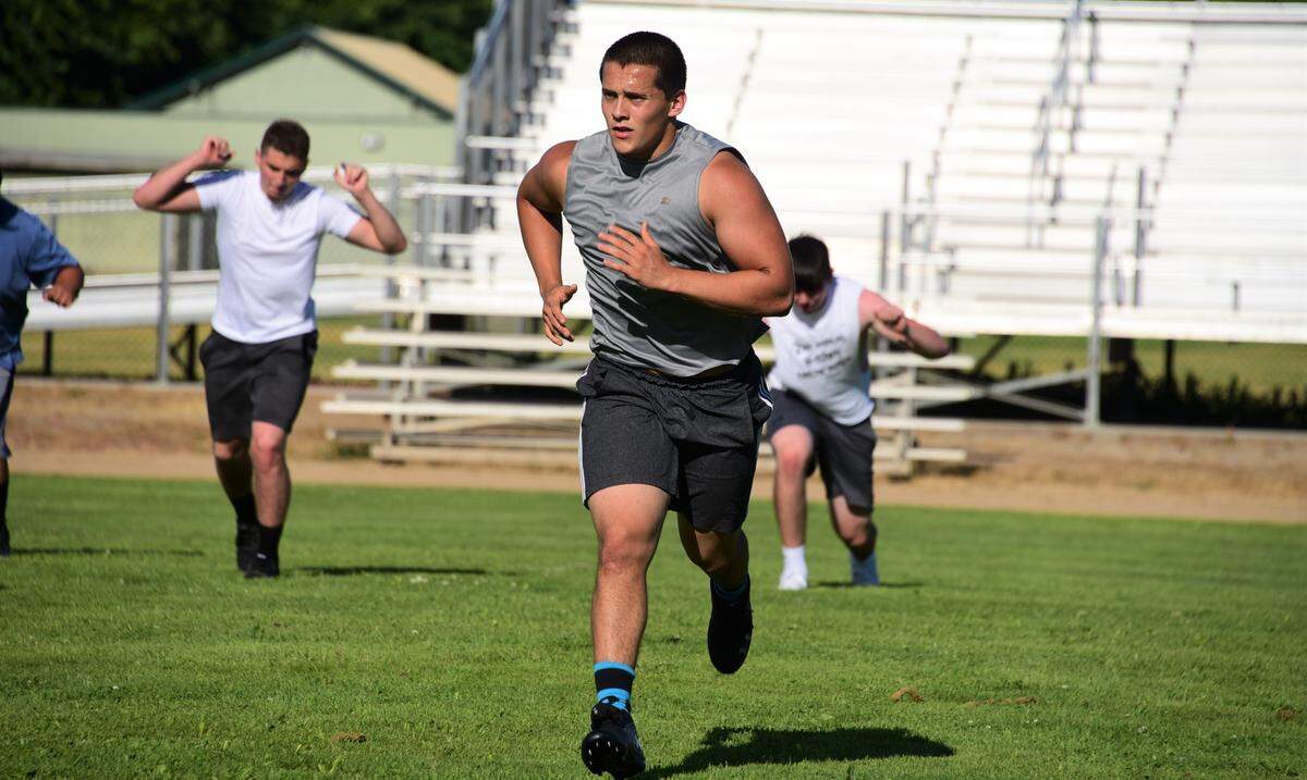 Hilmar High senior Trace Van Guilder runs during a workout at Hilmar High School on Wednesday, June 10, 2020.