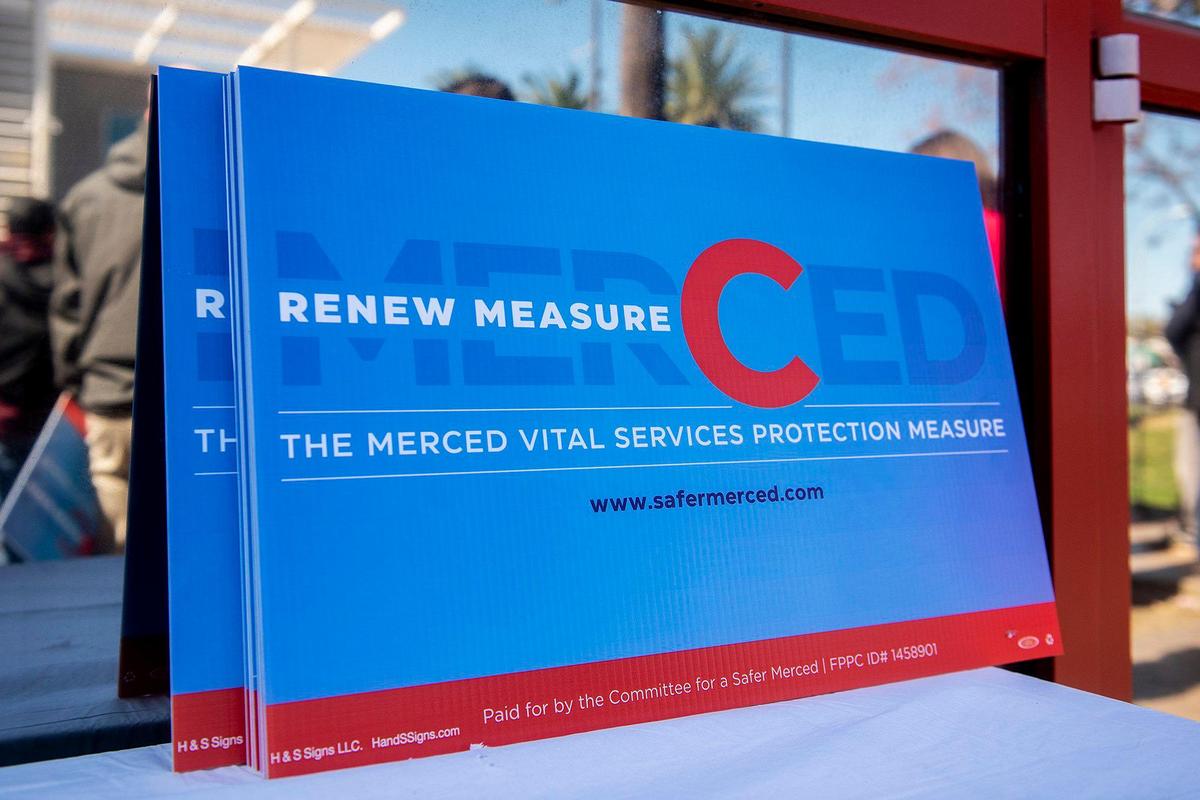 The Committee for a Safer Merced holds a kickoff rally for a petition drive to renew Measure C outside the Merced Civic Center in Merced, Calif., on Thursday, April 13, 2023. The half-cent sales tax was approved in 2006 and funds more than 30 public safety positions as well as providing resources for emergency responses and road improvements. The measure is set to expire in 2026.