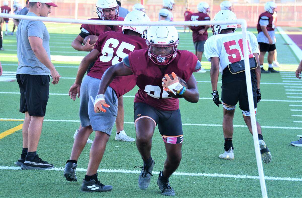 Golden Valley High School junior Deavon Williams runs the ball during practice on Tuesday, Aug. 15, 2023 at Veteran Stadium in Merced, Calif.