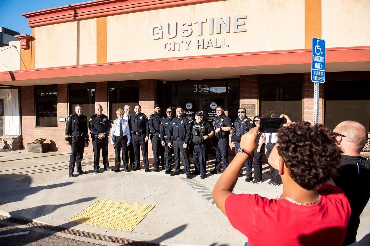 Gustine police officers pose for photo following a swearing in ceremony for four new Gustine Police Department Reserve Officers in Gustine, Calif., on Tuesday, June 20, 2023.