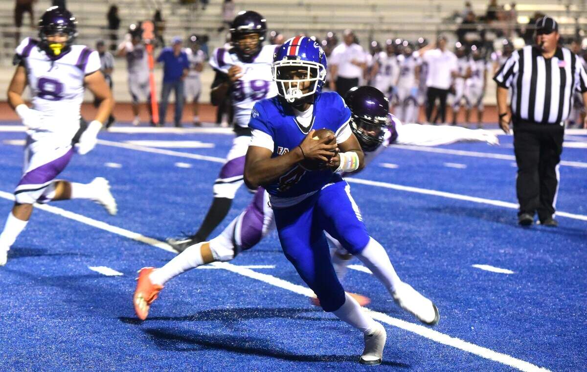 Atwater High quarterback AJ Banks scrambles with the ball during a game against Pacheco on Friday, Aug. 23, 2024 at Dave Honey Stadium in Atwater, Calif.