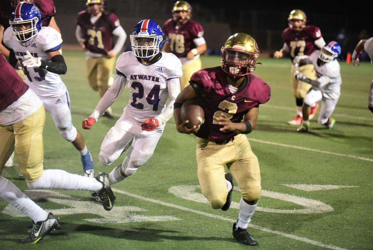Golden Valley High senior running back Jahkylle Smith (2) rushed for 211 yards and three touchdowns to help lead the Cougars to a 45-38 win over Atwater on Friday, Oct. 7, 2022 at Veterans Stadium in Merced, Calif.