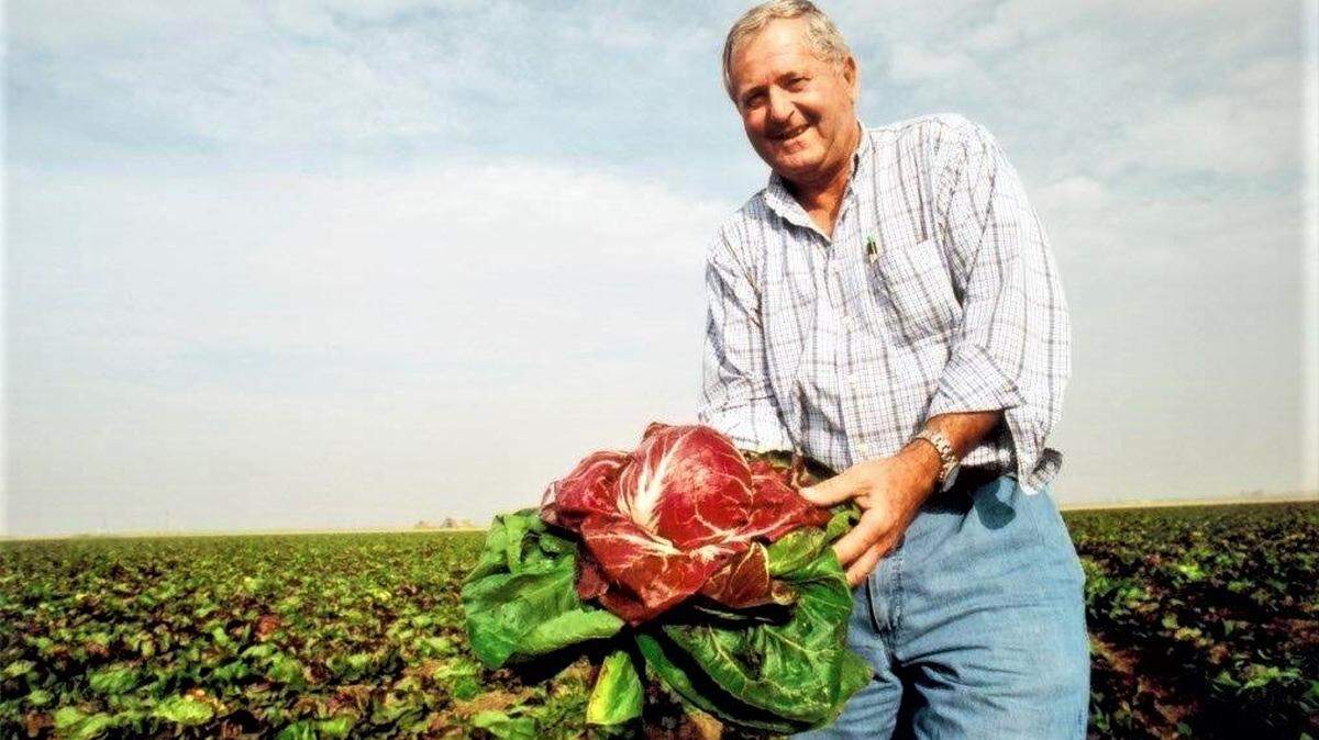 Le Grand farmer Joe Marchini holds up a radicchio plant in 1992.