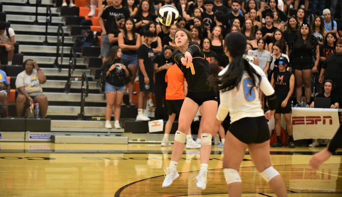 El Capitan High School senior Gianna Veldhuis (7) digs a ball against Merced on Wednesday, Sept. 7, 2022.