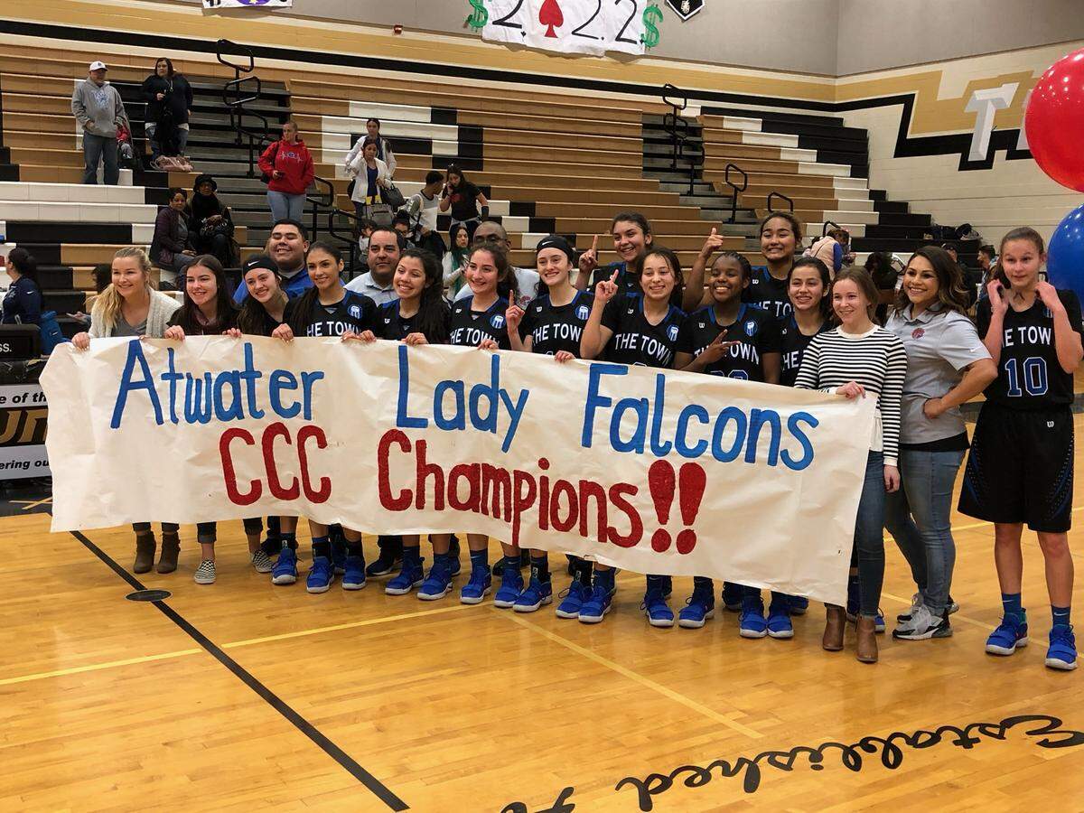 The Atwater High girls basketball team poses for a picture after clinching the Central California Conference championship with an 83-48 win over Buhach Colony on Thursday night at Buhach Colony High.