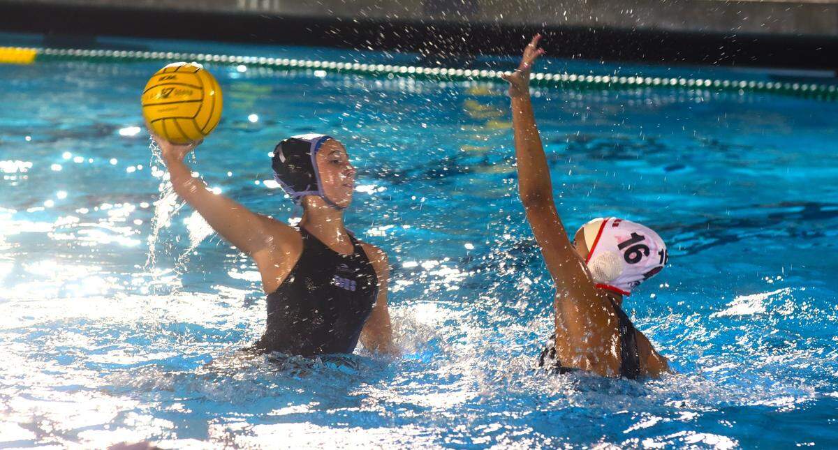 El Capitan High School sophomore Brooklyn Ramsey (7) fires a shot from outside during a playoff game against Merced on Tuesday, Nov. 7, 2023.