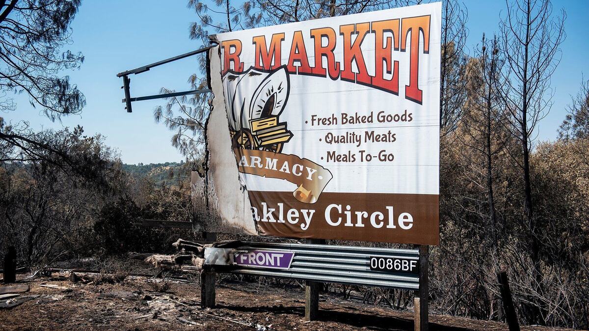 A burned sign along Highway 140 in Mariposa County, Calif., on Wednesday, July 10, 2024. According to fire officials, the French Fire started on July 4 in the area of French Camp Road and Highway 49 North in Mariposa County. The cause of the fire is under investigation.