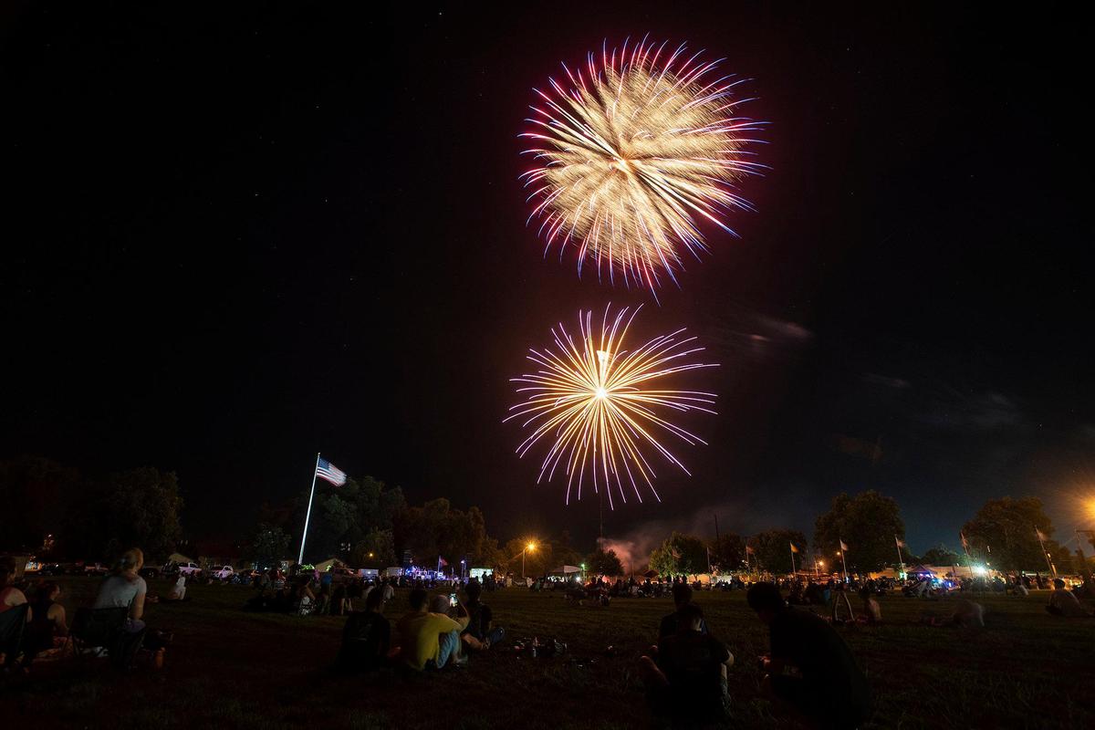 Fireworks explode in the night sky during a Fourth of July concert and fireworks show at the former Castle Air Force Base in Atwater, Calif., on Sunday, July 4, 2021.