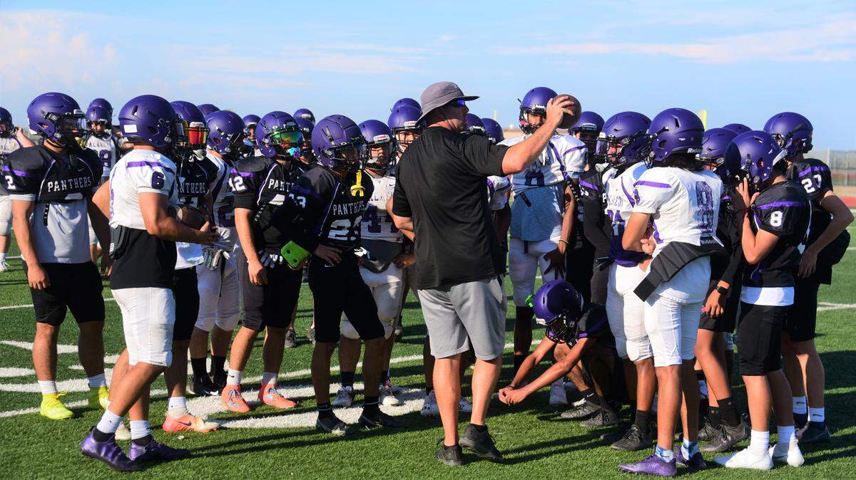 Pacheco High School head coach Jeremy Siemiller speaks to the team during practice on Wednesday, Aug. 3, 2022 at Pacheco High School in Los Banos, Calif.