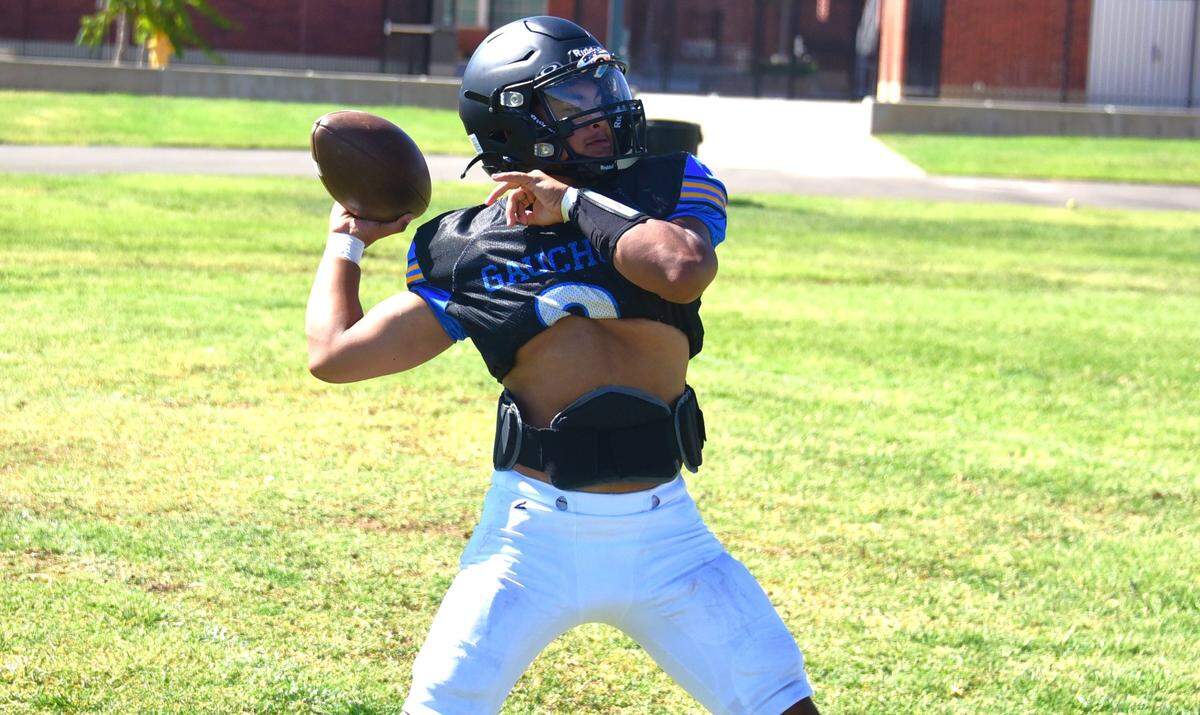 El Capitan High quarterback Sergio Mendoza throws a pass during practice on Tuesday, Aug. 20, 2024.