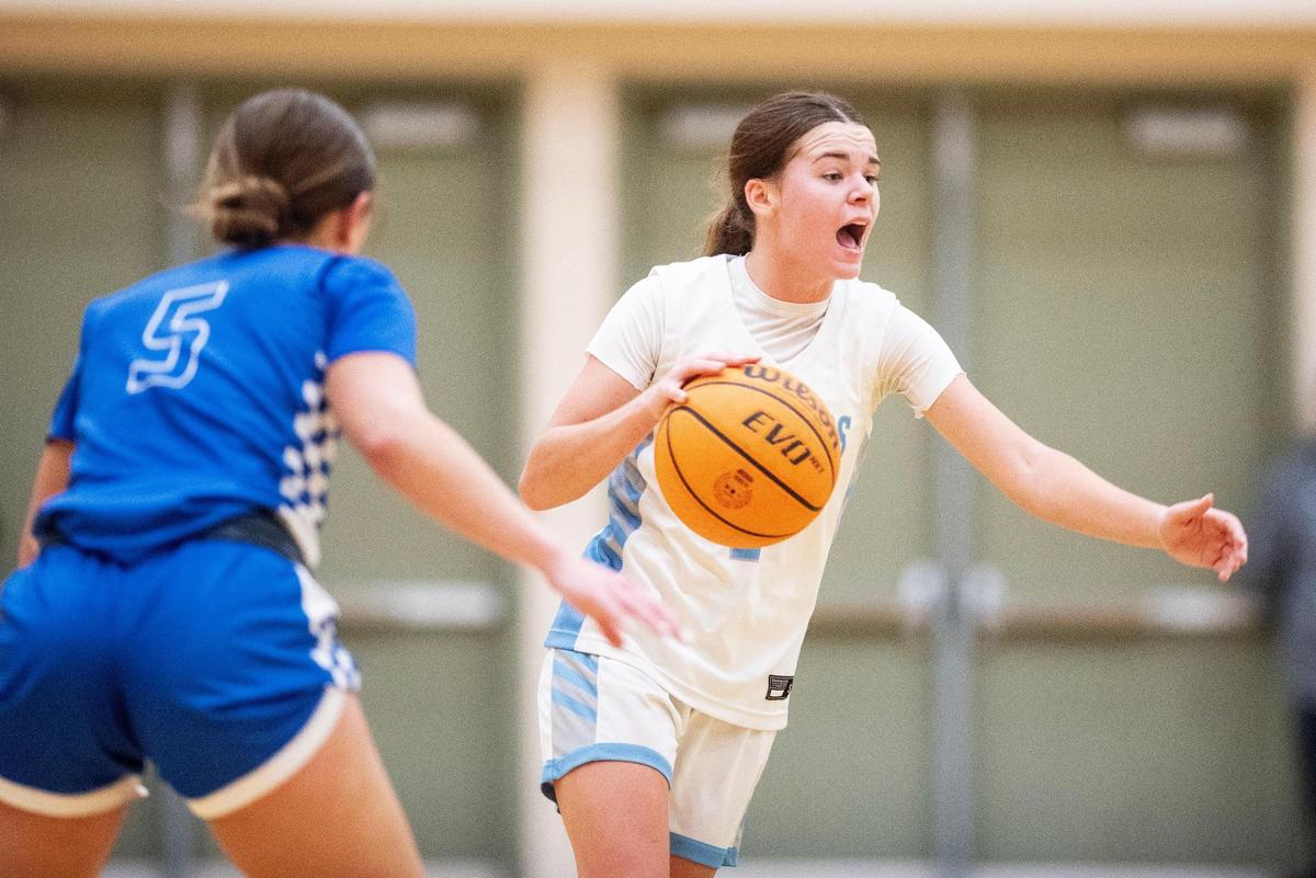 El Capitan junior Madysen Dietz (1) yells to teammates while dribbling up the court during a game against Atwater at El Capitan High School in Merced, Calif., on Thursday, Feb. 6, 2025. The Gauchos beat the Falcons 57-47.