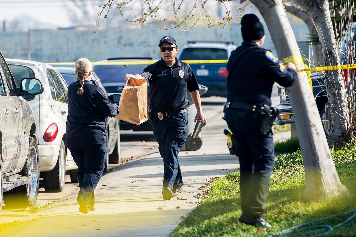 The Merced Police Department investigates the scene of a homicide and home invasion in the 400 block of Tucolay Court in Merced, Calif., on Friday, Jan. 25, 2019. According to Lt. Jay Struble, a 34-year-old man died of injuries consistent with a gunshot wound, after multiple people entered the home early Friday morning. Police said the suspects stole items from the residence before fleeing the area.