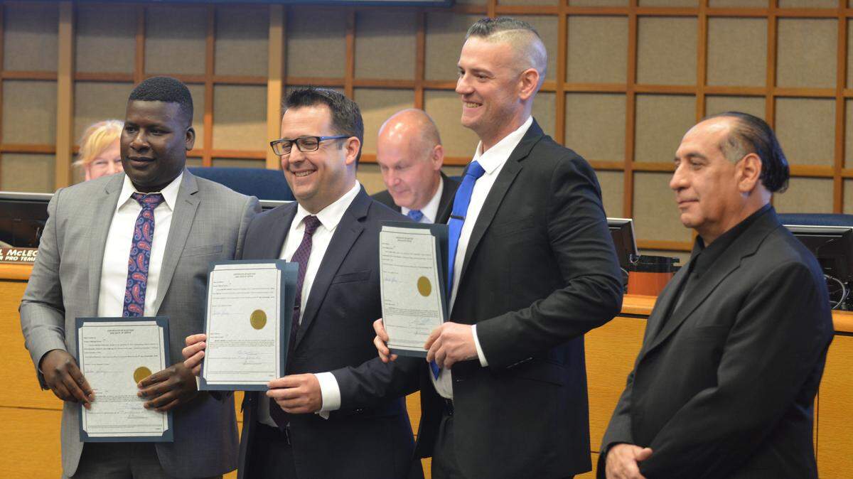 From left, Merced City Councilman Delray Shelton, Mayor Mike Murphy, Councilman Kevin Blake and Councilman Fernando Echevarria pose for a photo after being sworn in Dec. 17, 2018, following successful election campaigns.