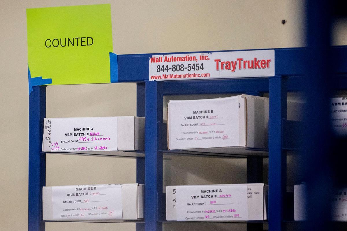 Boxes of counted ballots are organized on a shelf at the Merced County Election Warehouse in Merced, Calif., on Thursday, Nov. 7, 2024. Election officials and workers continue to count tens of thousands of ballots following the Nov. 5, General Election.