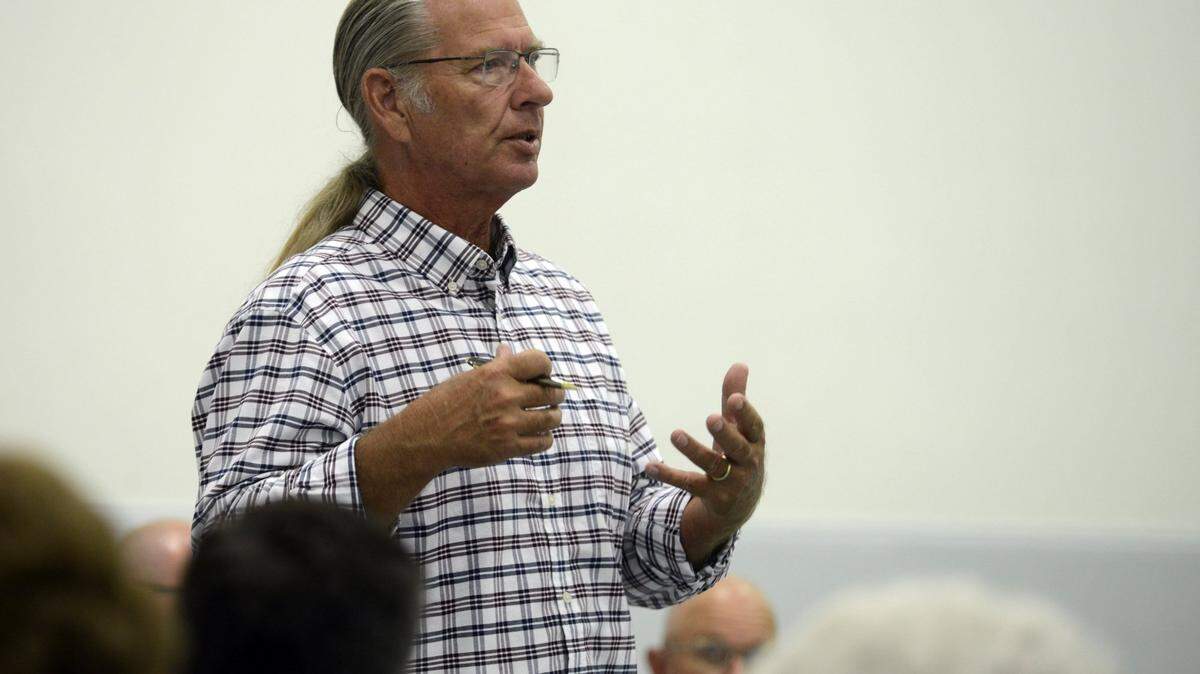 Atwater Mayor Jim Price speaks to several dozen people during a town hall meeting on Thursday, Aug. 27, 2015, at the community Center. The discussion tops ranged from water to taxes, and to economic development.