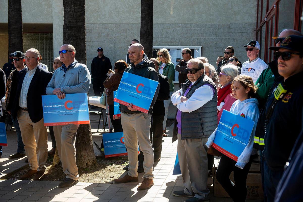 The Committee for a Safer Merced holds a kickoff rally for a petition drive to renew Measure C outside the Merced Civic Center in Merced, Calif., on Thursday, April 13, 2023. The half-cent sales tax was approved in 2006 and funds more than 30 public safety positions as well as providing resources for emergency responses and road improvements. The measure is set to expire in 2026.