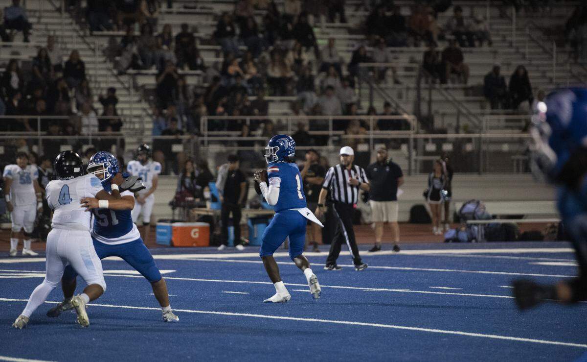Atwater quarterback Ali Banks Jr. looks downfield for a receiver during the Falcons’ 49-41 homecoming victory over El Capitan. The senior leads the CCC in passing yards.