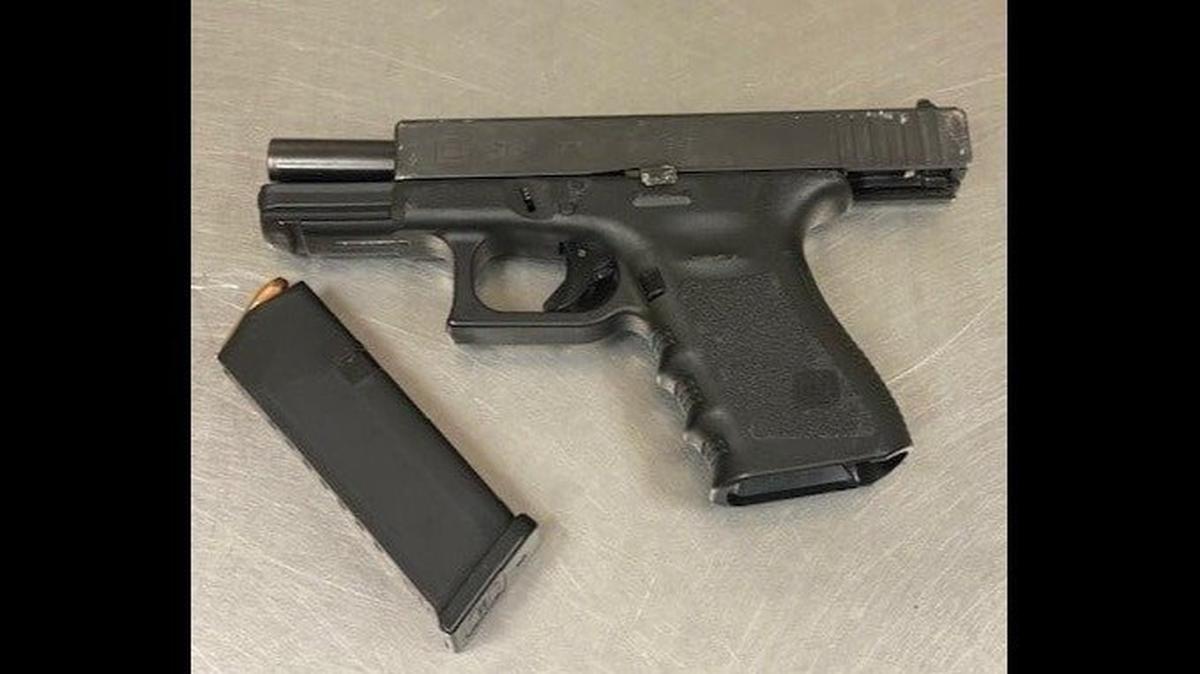A suspected gang member was arrested during a traffic stop in Merced on Wednesday, after officers reportedly witnessed a firearm slide across the road as if it had been thrown from a vehicle, according to the Merced Police Department. Police said the vehicle’s occupant admitted to officers that he threw the firearm from the vehicle. Image courtesy of Merced Police Department.