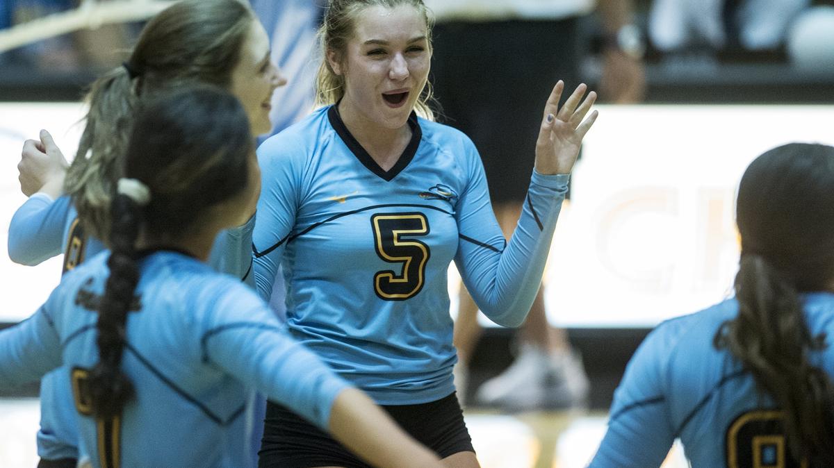 El Capitan junior Natalie Collins (5) celebrates a Gauchos point with teammates during a match against Merced at El Capitan High School in Merced, Calif., on Wednesday, Sept. 12, 2018. The Gauchos beat the Bears 3-0.