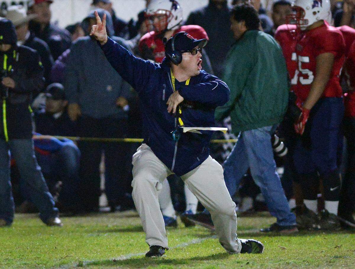 Strathmoore coach Jeromy Blackwell calls out plays aginst St. Patrick-St. Vincent in their CIF State Division 6-A football championship game at Strathmore High in 2016. Blackwell is trying to lead the Spartans to back-to-back state championships on Saturday against Hilmar.