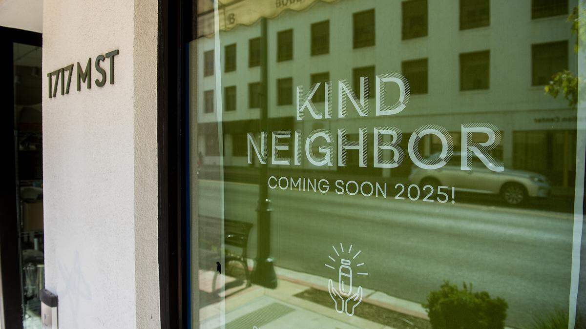 Signage for Kind Neighbor, a Merced juice bar, is seen in the windows at 1717 M Street in Merced, Calif., on Monday, Aug. 25, 2025. The juice bar will be reopening in the new location in September. 