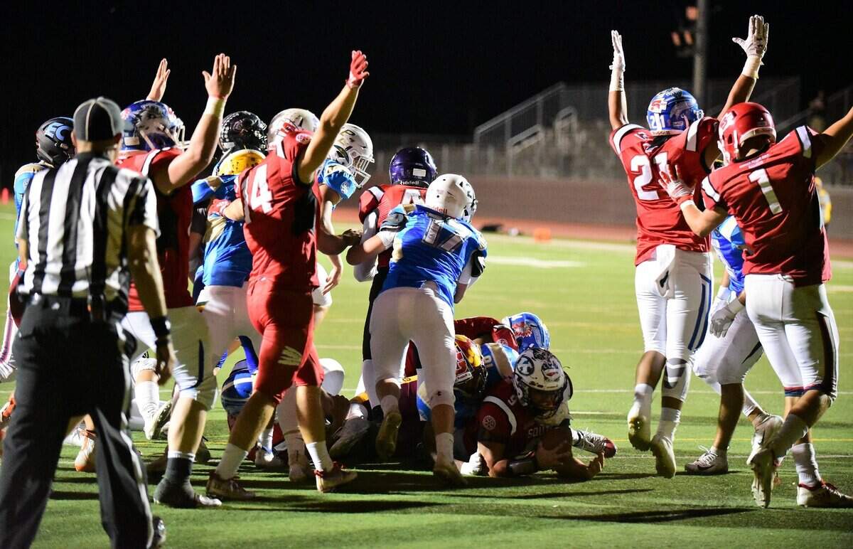 The South celebrates a touchdown by Clovis East’s Ryan Hunt (9) during the second half of the 34th annual North/South Rotary Bob Green Classic on Saturday, June 22, 2019 at Veteran Stadium. The South defeated the North 23-5.