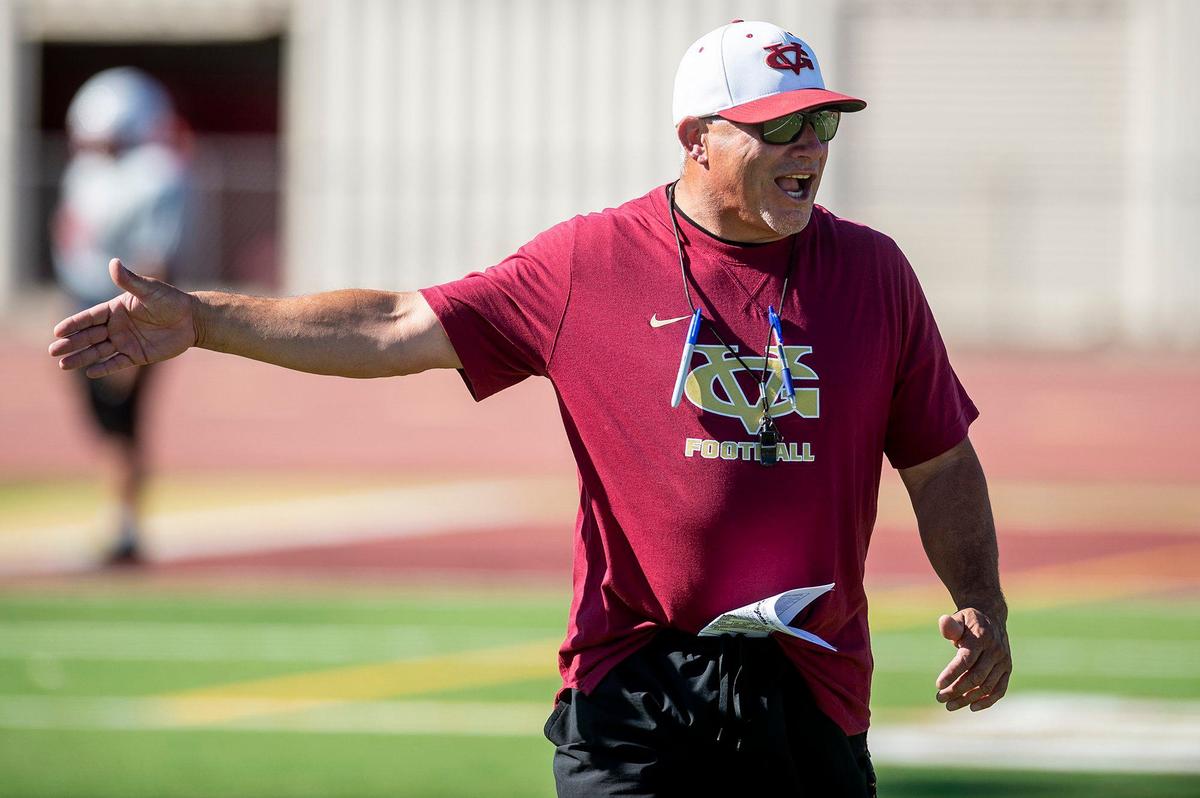 Golden Valley High School football head coach Rick Martinez calls out to his players during practice at Golden Valley High School in Merced, Calif., on Tuesday, Aug. 20, 2024.