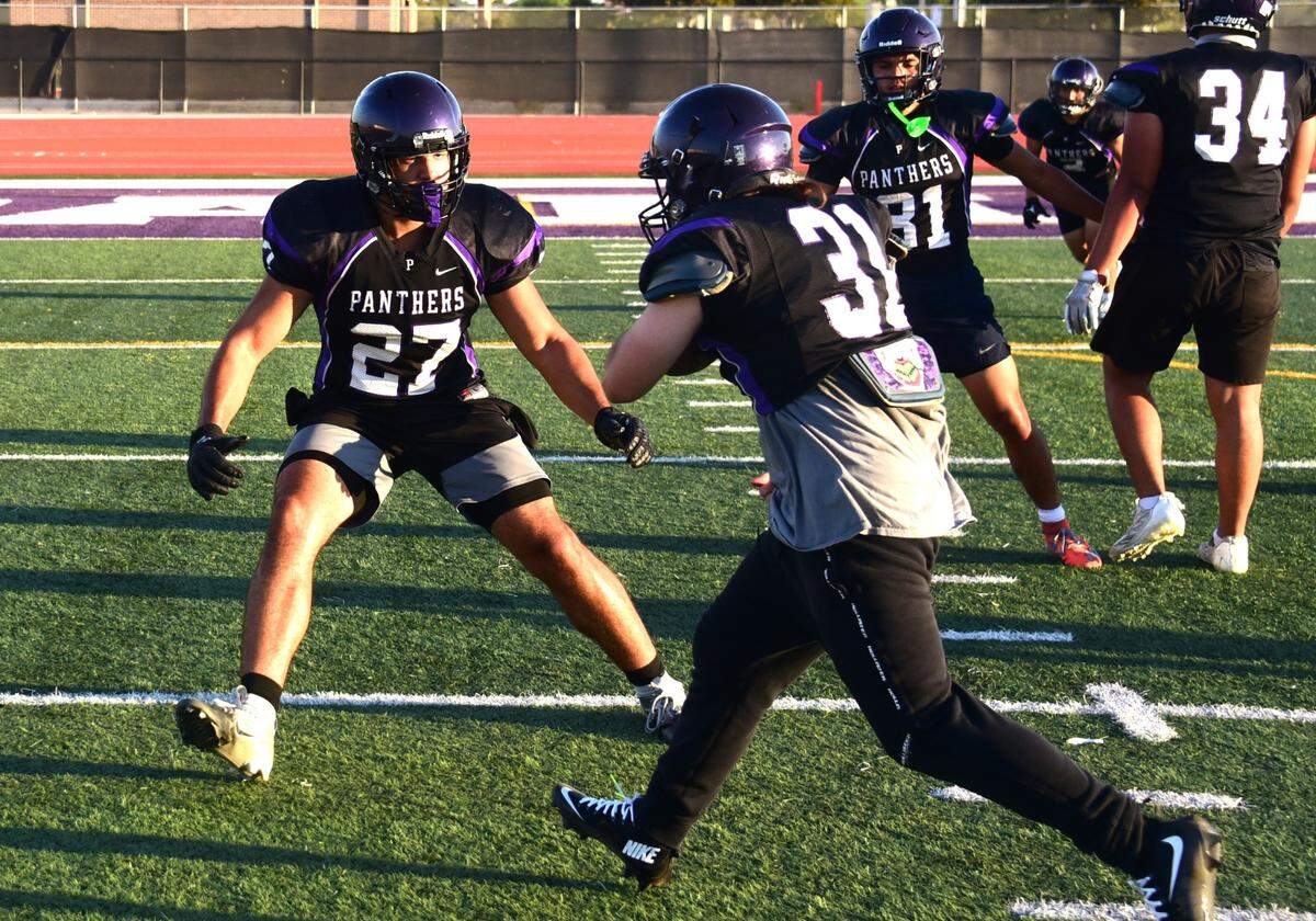 Pacheco High linebacker Peyton Mosley (27) prepares to make a stop during practice on Thursday, Aug. 1, 2024.