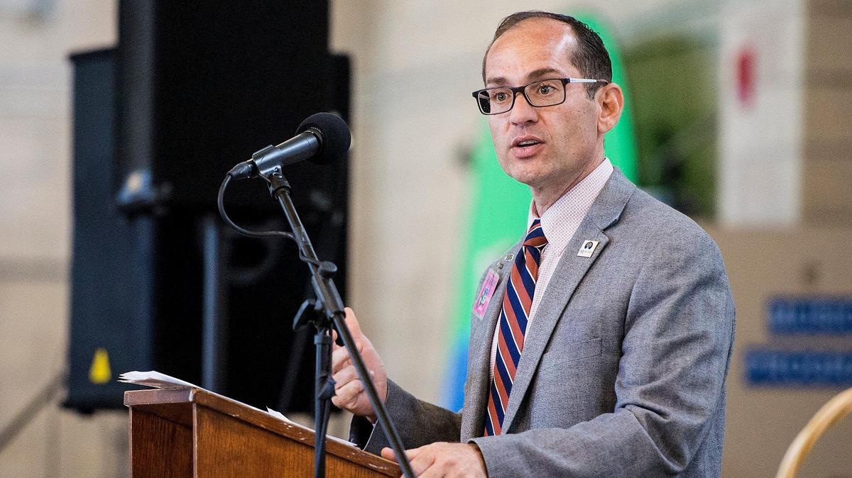 Merced Community College President Chris Vitelli, addressees inmate graduates during a graduation ceremony at Valley State Prison in Chowchilla, Calif., on Wednesday, May 1, 2019. The ceremony recognized more than 60 inmates for their educational achievements including associate degrees, high school diplomas, general education development certifications and those who have completed career technical education programs.