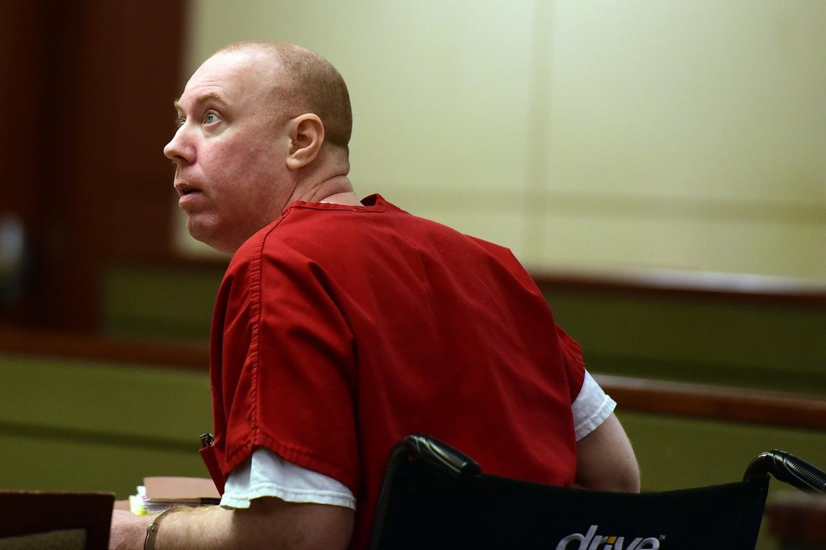 Kevin Mayhew speaks with a Merced County prosecutor on Monday, Dec. 10, 2018, in the attempted murder trial in which he is representing himself.
