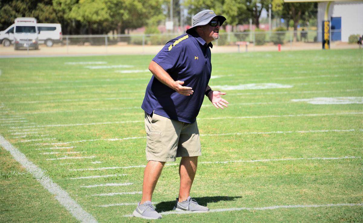 Merced College coach Bob Casey argues a penalty against the Blue Devils during a game against Los Medanos on Saturday, Sept. 11, 2021 at Don Odishoo Field in Merced, Calif.