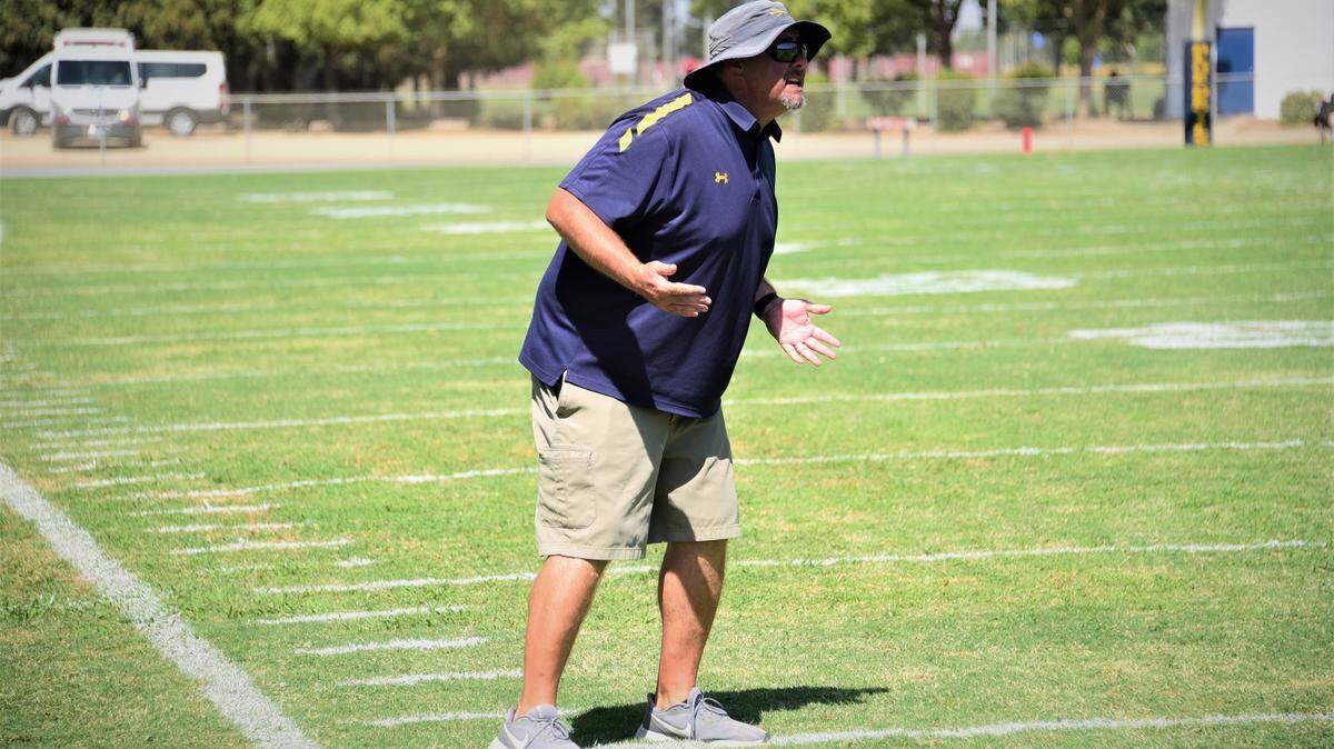 Merced College coach Bob Casey argues a penalty against the Blue Devils during a game against Los Medanos on Saturday, Sept. 11, 2021 at Don Odishoo Field in Merced, Calif.