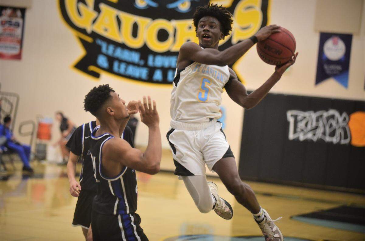 El Capitan High senior Gregory Mack (5) goes up for a shot during a game at the Stable Center at El Capitan High School on Friday, Jan. 14, 2022 in Merced, Calif.
