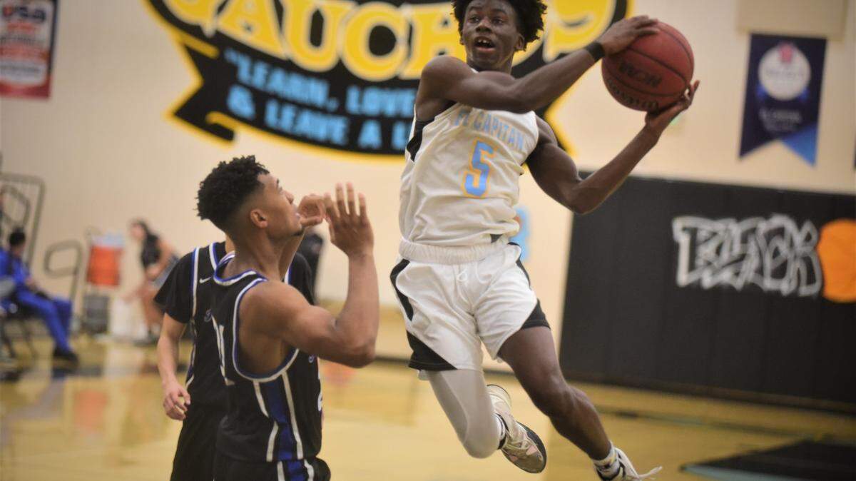 El Capitan High senior Gregory Mack (5) goes up for a shot during a game at the Stable Center at El Capitan High School on Friday, Jan. 14, 2022 in Merced, Calif.
