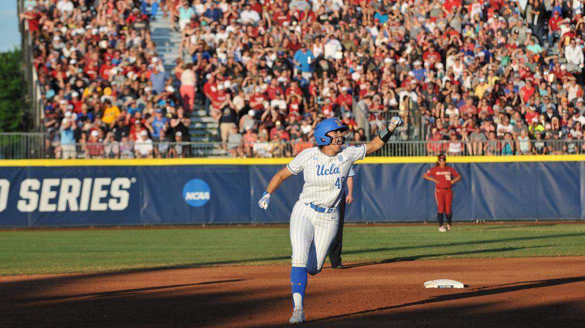 Madilyn “Bubba” Nickles celebrates while rounding the bases after hitting a home run against Oklahoma during the 2019 College World Series. Nickles is one of 15 players selected for the 2020 Olympic Softball Team.