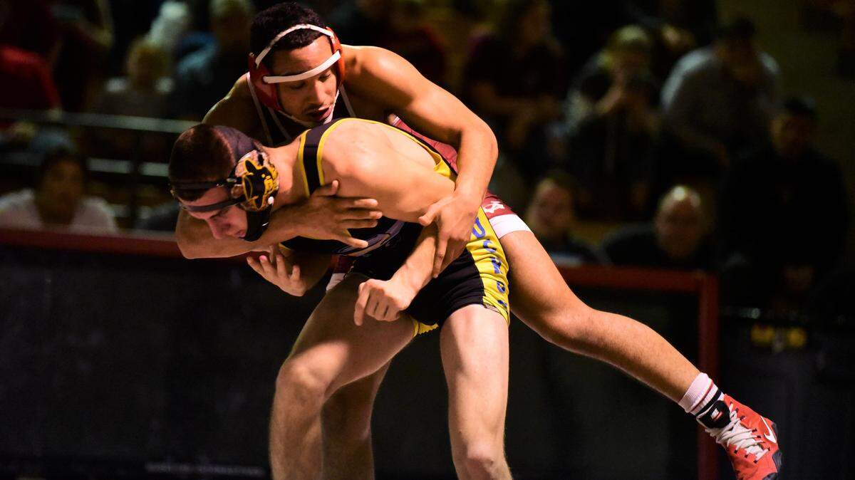 Golden Valley senior Willie Ward-Willams attempts to score against El Capitan’s Zachary Haase Jr. during their 154-pound match on Tuesday, Jan. 28, 2020 at Cougar Arena.
