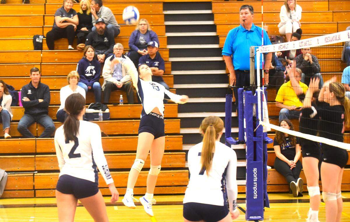 Stone Ridge Christian junior Mikyla Beene goes up to hit the ball during the Sac-Joaquin Section Division VI championship match against Sacramento Country Day on Saturday, Nov. 4, 2023 at Modesto Junior College.
